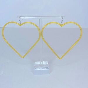 NEW…Yellow heart shaped earrings OS (one size) from CHARLOTTE RUSSE